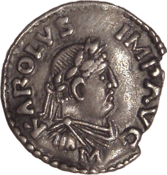 A denarius of Charlemagne dated c. 812–814 with the inscription KAROLVS IMP AVG (Karolus Imperator Augustus) (in Latin)